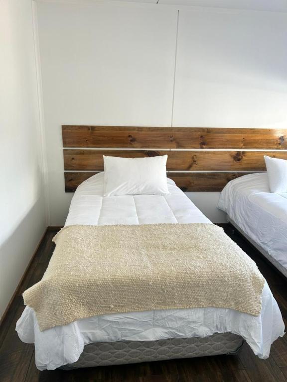 Postel nebo postele na pokoji v ubytování Terra Hostal