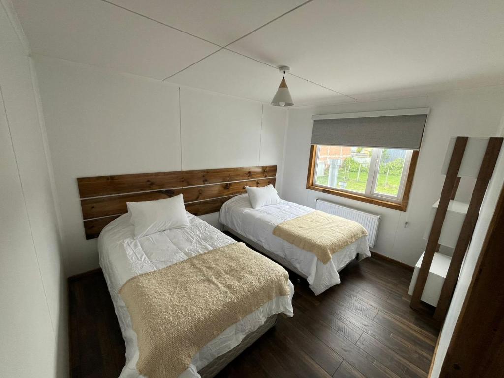 Postel nebo postele na pokoji v ubytování Terra Hostal