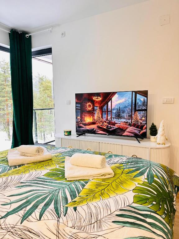 TV a/nebo společenská místnost v ubytování Lexi Green Hills apartman