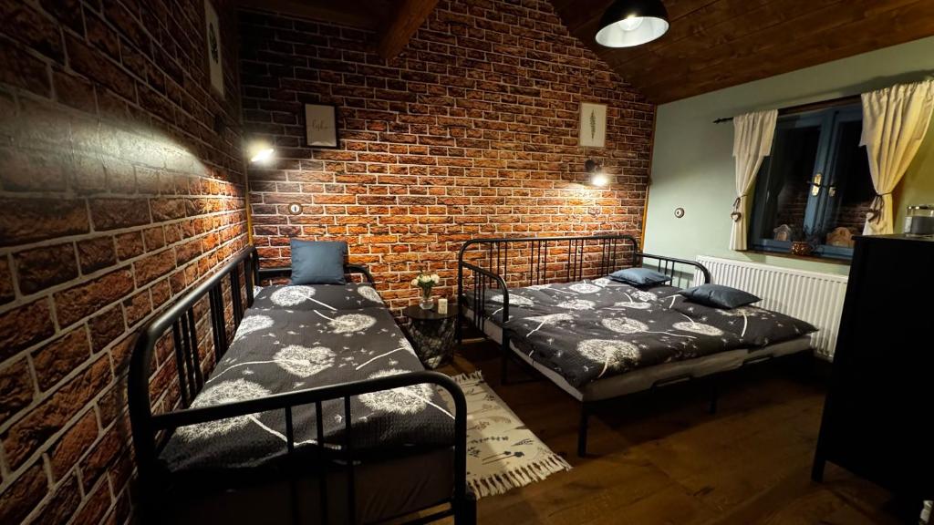 Postel nebo postele na pokoji v ubytování Chalupa - Josefína