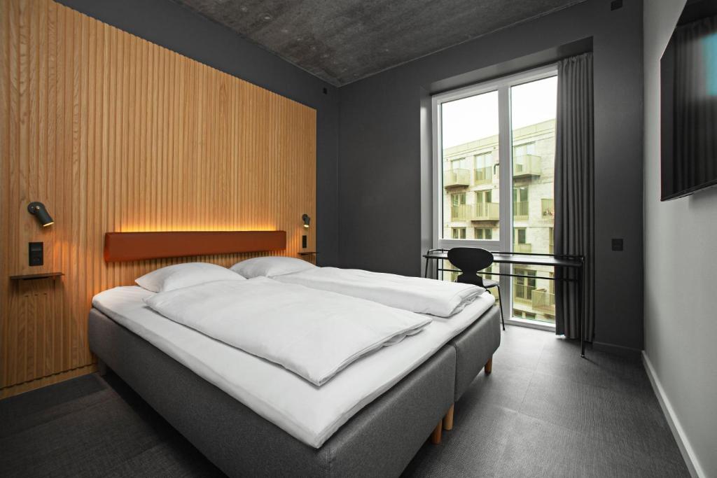 Postel nebo postele na pokoji v ubytování Four Points Flex by Sheraton Hillerød