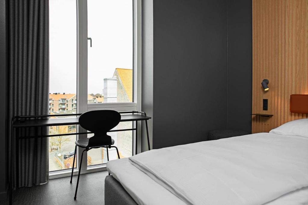 Postel nebo postele na pokoji v ubytování Four Points Flex by Sheraton Hillerød