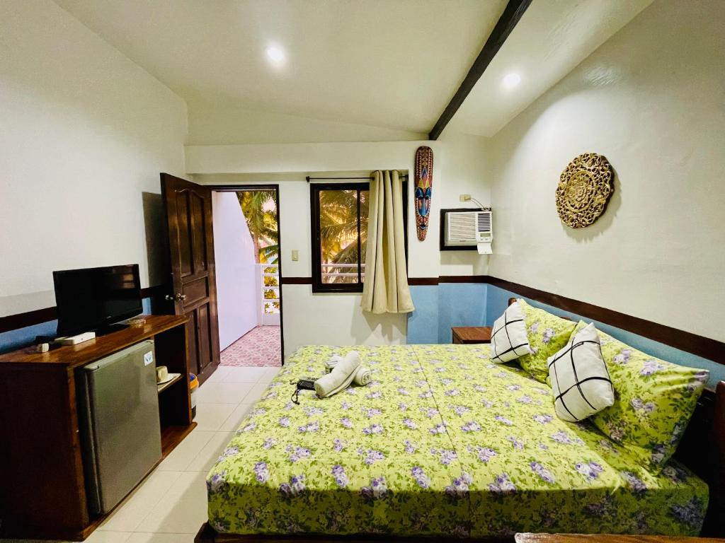 Postel nebo postele na pokoji v ubytování Casa Fiesta Resort