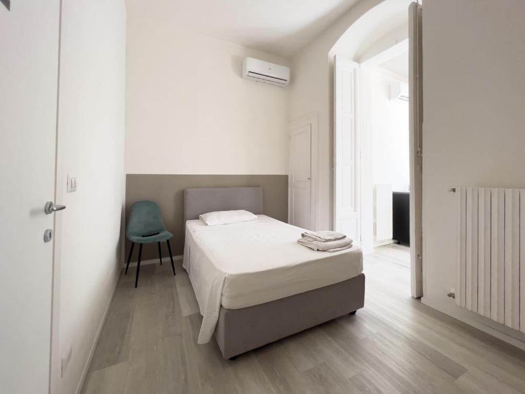 A bed or beds in a room at b&b boutique suite bari