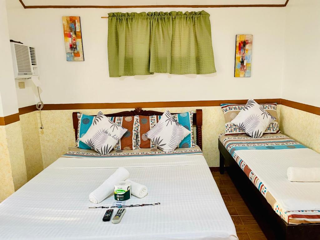 Postel nebo postele na pokoji v ubytování Casa Fiesta Resort