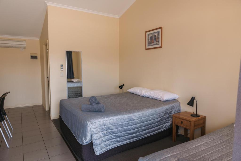 Postel nebo postele na pokoji v ubytování Moura Motel