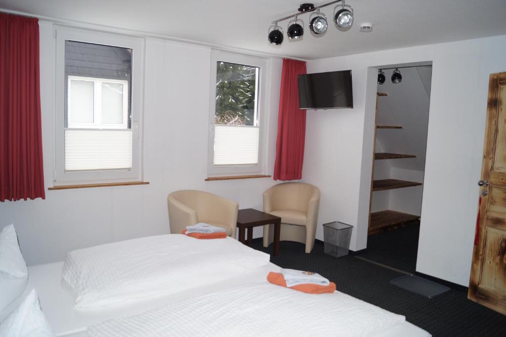 Postel nebo postele na pokoji v ubytování Dein Hotel