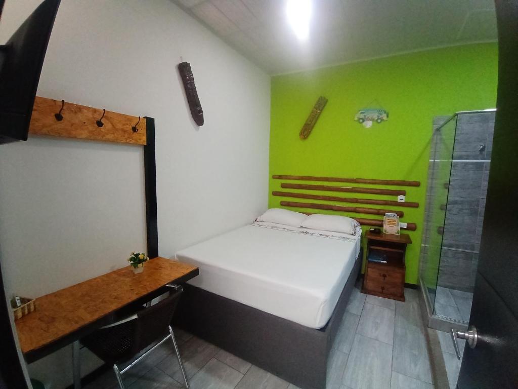 Postel nebo postele na pokoji v ubytování PH BOUTIQUE HOTEL Girardot
