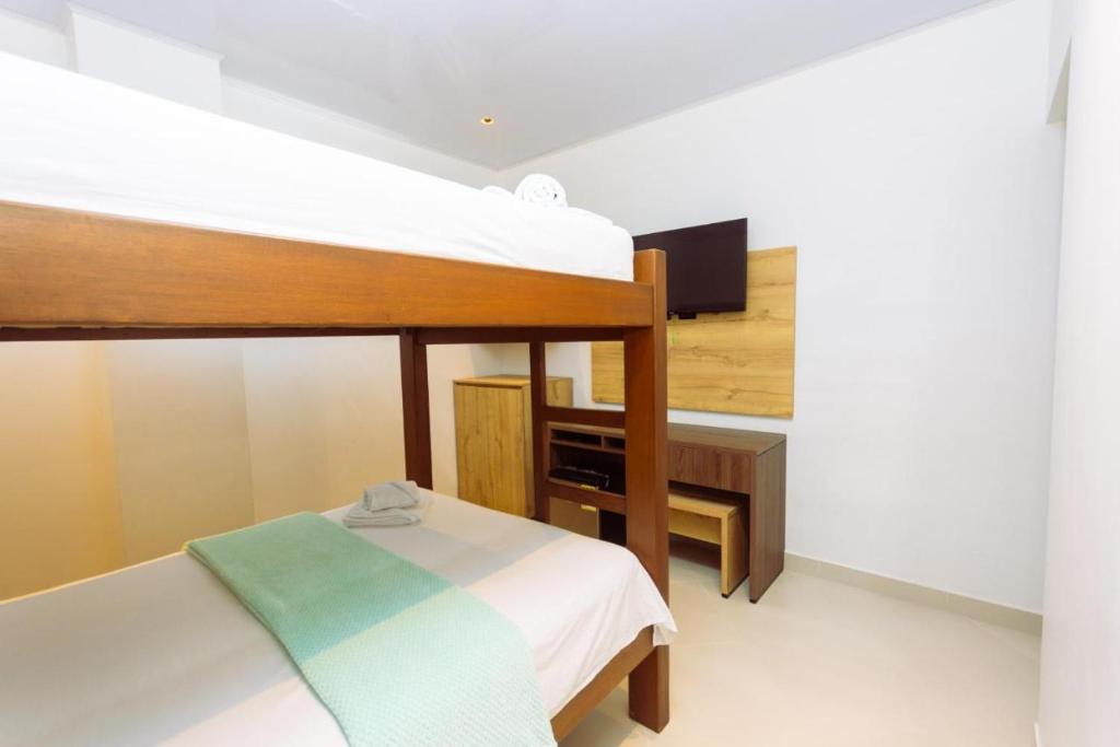 Postel nebo postele na pokoji v ubytování Hotel Luna Verde