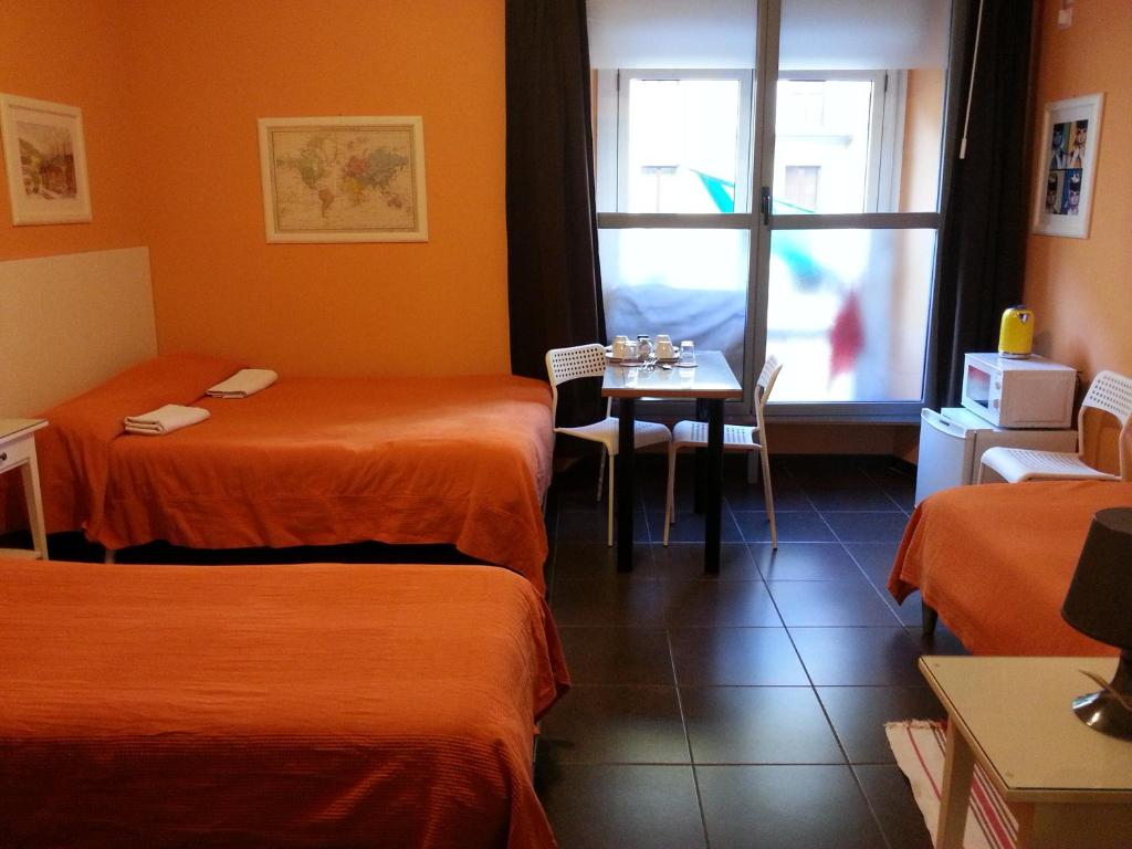 Postel nebo postele na pokoji v ubytování Affittacamere Andronaco