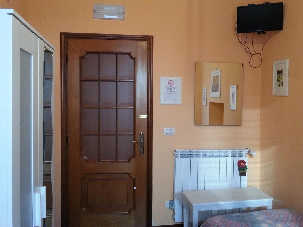 TV a/nebo společenská místnost v ubytování Affittacamere Andronaco