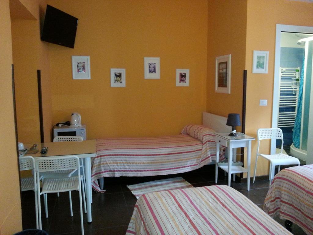 Postel nebo postele na pokoji v ubytování Affittacamere Andronaco