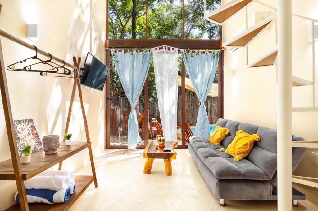 Posezení v ubytování Loft Cabins In Cenotes Natural Park Tulum