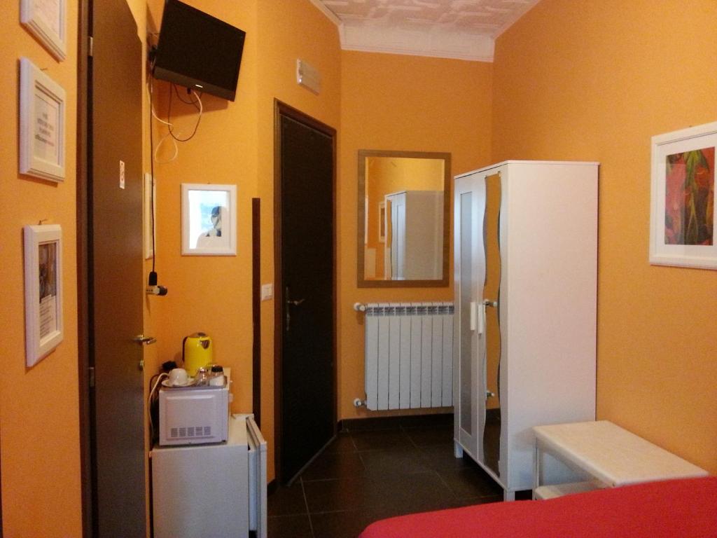 Postel nebo postele na pokoji v ubytování Affittacamere Andronaco