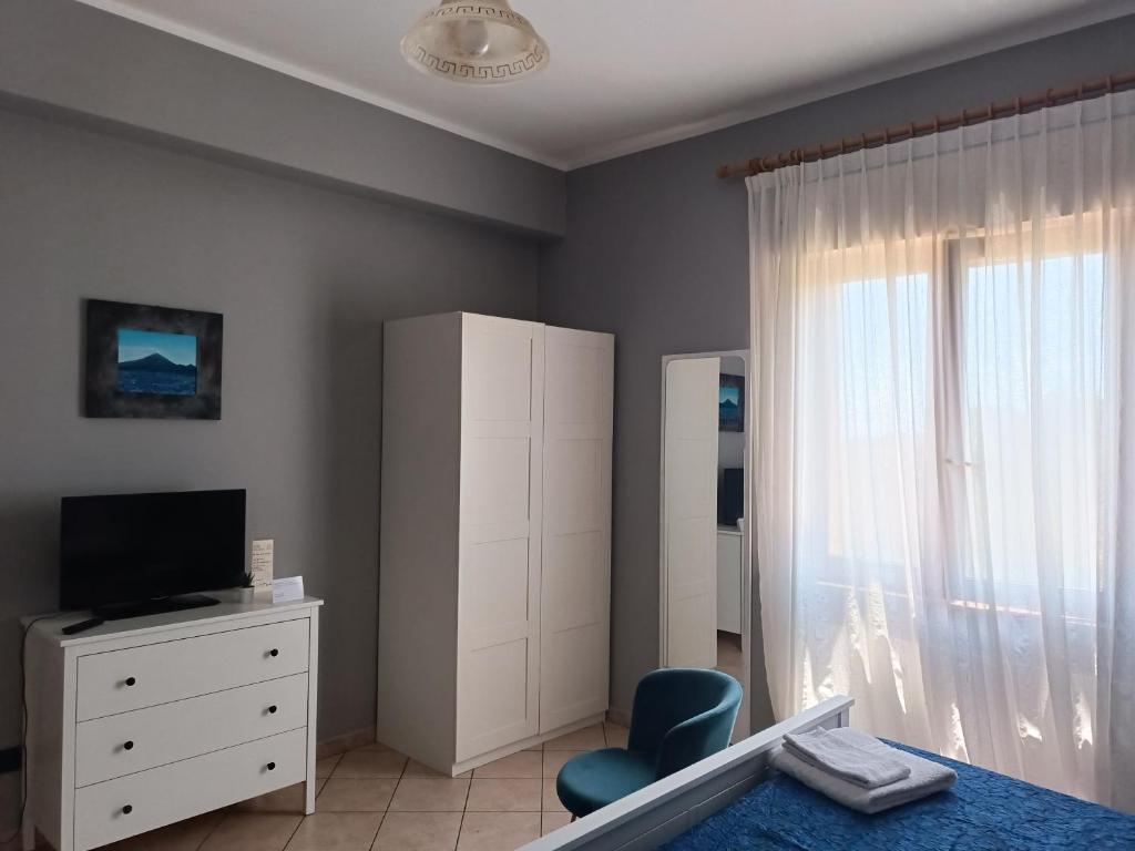 TV a/nebo společenská místnost v ubytování B&B Bellavista Gerace