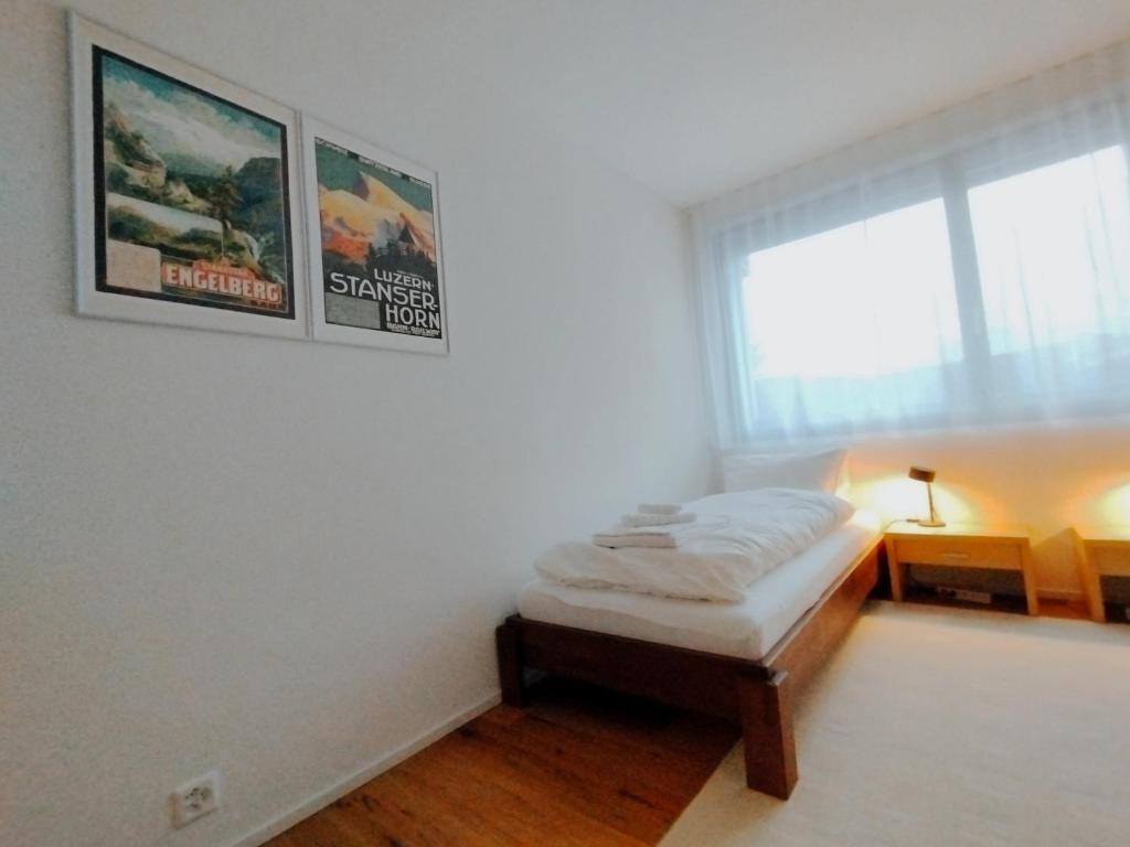 Postel nebo postele na pokoji v ubytování Luxury Escape - Titlis Panorama