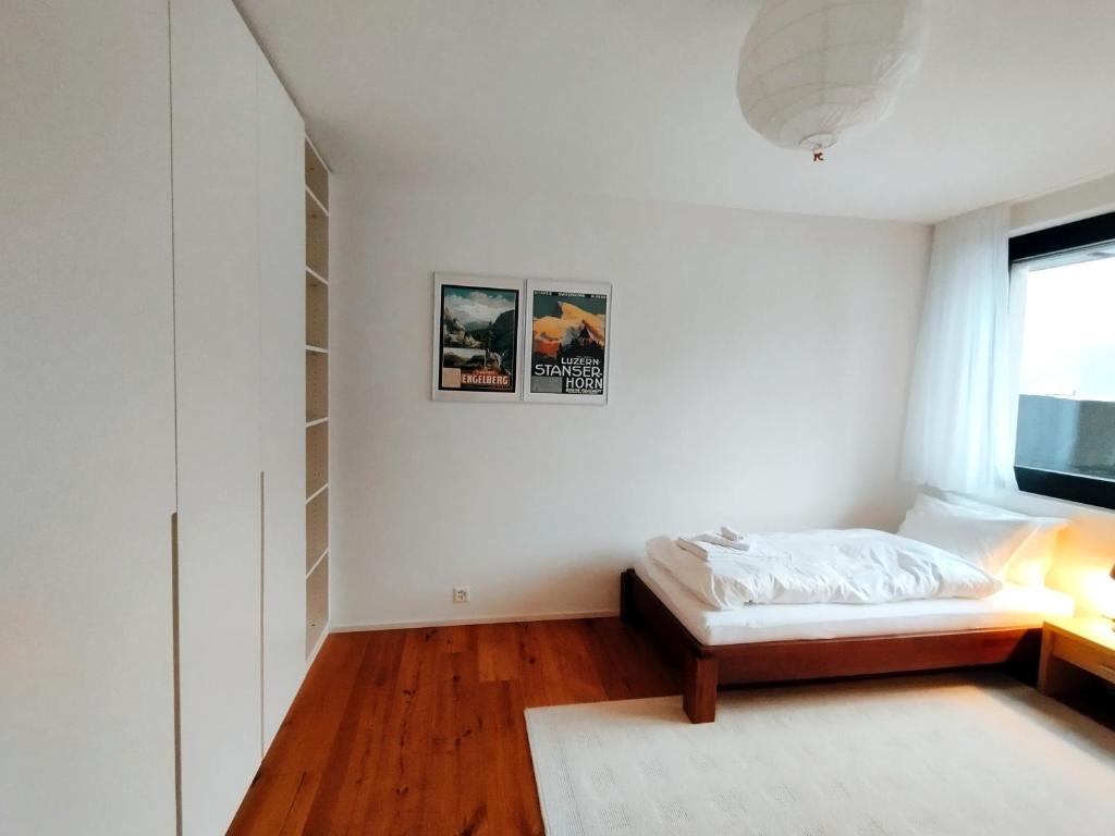 Postel nebo postele na pokoji v ubytování Luxury Escape - Titlis Panorama
