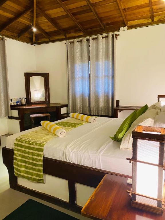 Postel nebo postele na pokoji v ubytování Kings Rest Sigiriya