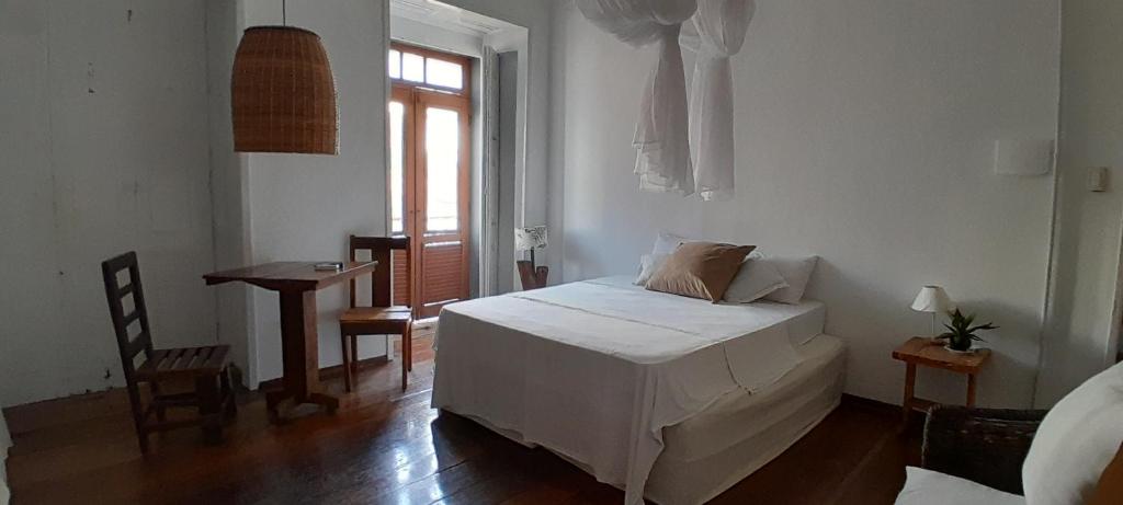 Americo Pousada e Hostel - Quadruple Room With Balcony