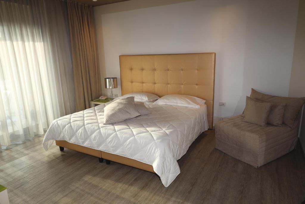 Postel nebo postele na pokoji v ubytování One Hotel & Restaurant