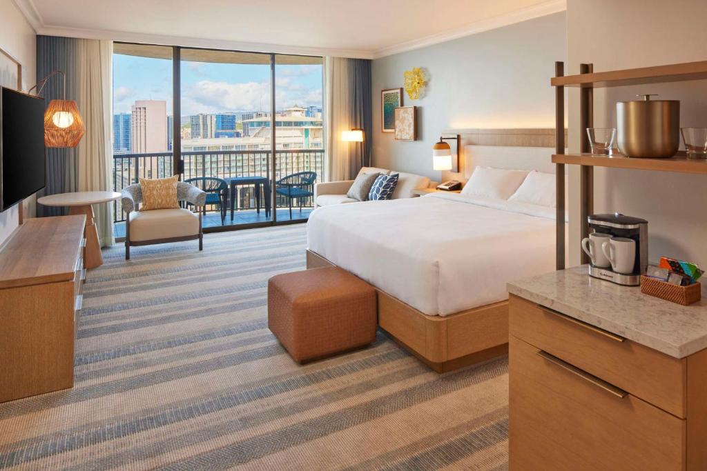 Postel nebo postele na pokoji v ubytování Hilton Hawaiian Village Waikiki Beach Resort