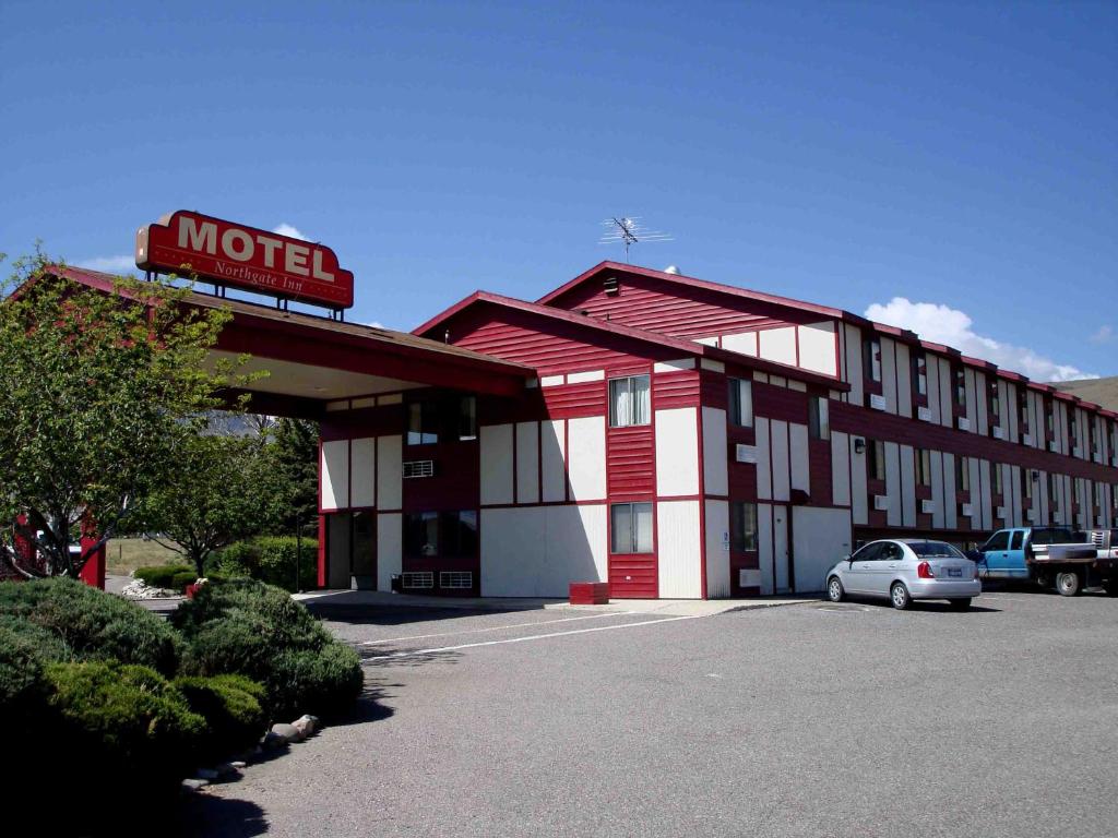 a motel with a car parked in front of it at Northgate Inn Motel in Challis