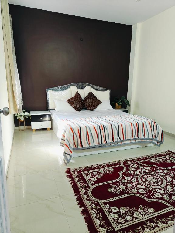 Letto o letti in una camera di Ava Homestay