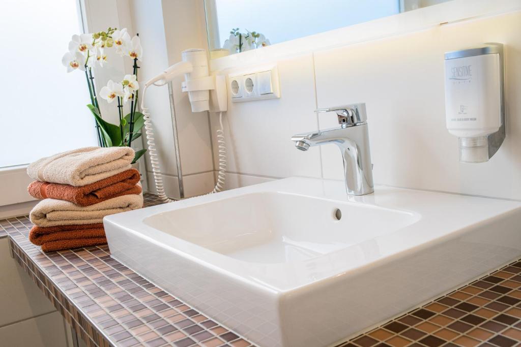 Koupelna v ubytování Flair Hotel Rieckmann