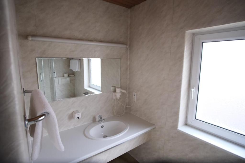 Koupelna v ubytování Hotel im Klosterring