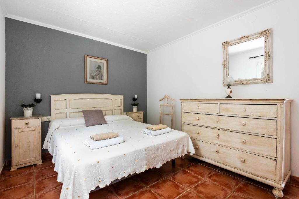 Posteľ alebo postele v izbe v ubytovaní Villa Mari - Calan Porter
