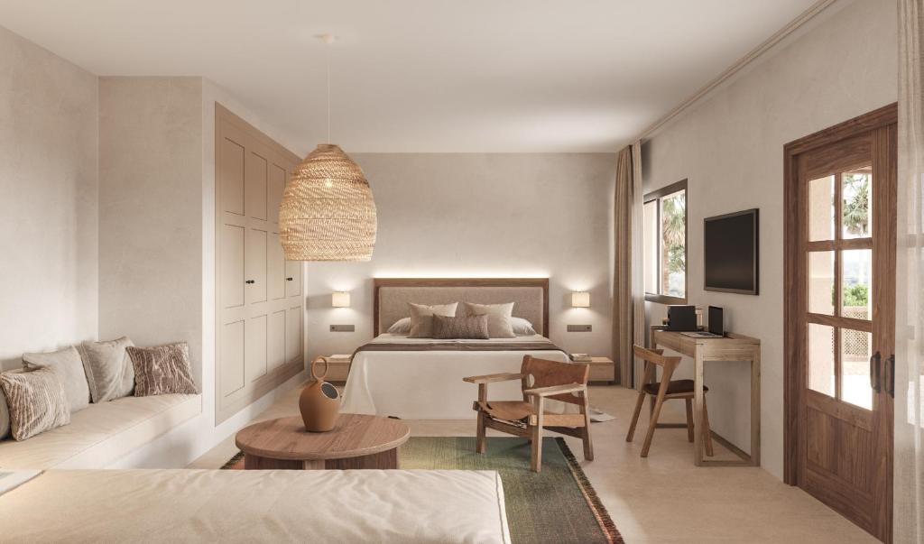 a bedroom with a bed and a living room at Can Jaume by Ocean Drive in Ibiza Town