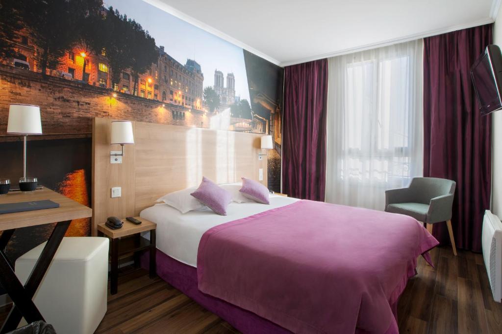 Postel nebo postele na pokoji v ubytování Best Western Rives de Paris La Defense