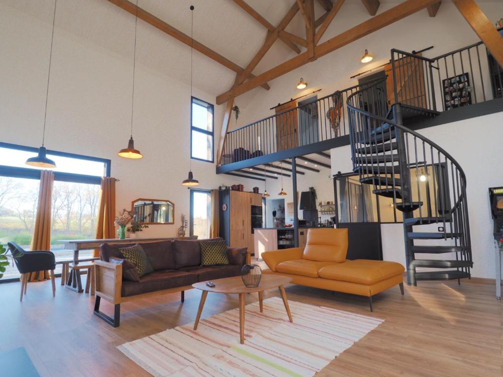 Posezení v ubytování Maison typique du Périgord, séchoir à tabac avec piscine chauffée