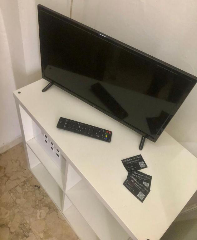 TV a/nebo společenská místnost v ubytování Il balcone sullo Stretto