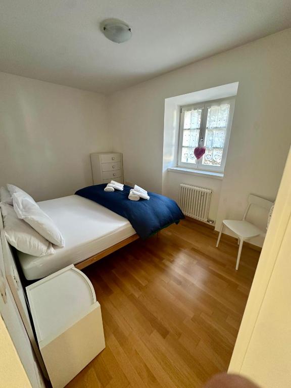Postel nebo postele na pokoji v ubytování Val di Non Apartment