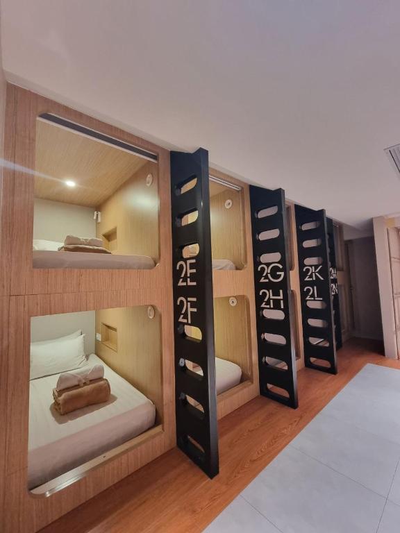 Postel nebo postele na pokoji v ubytování Moonstar Cebu Hotel