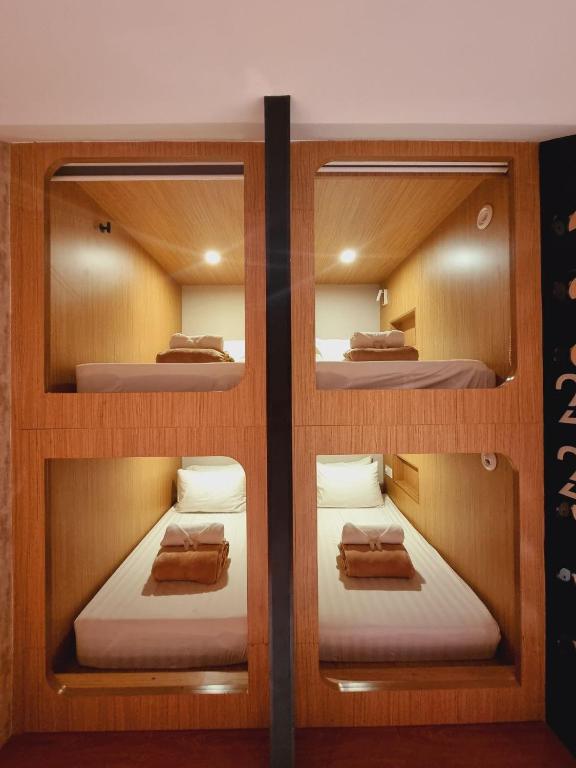 Postel nebo postele na pokoji v ubytování Moonstar Cebu Hotel