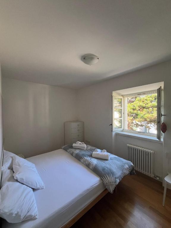 Postel nebo postele na pokoji v ubytování Val di Non Apartment