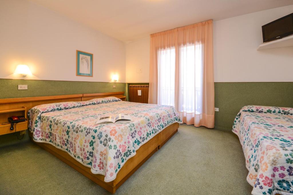 Posteľ alebo postele v izbe v ubytovaní Hotel Splendor