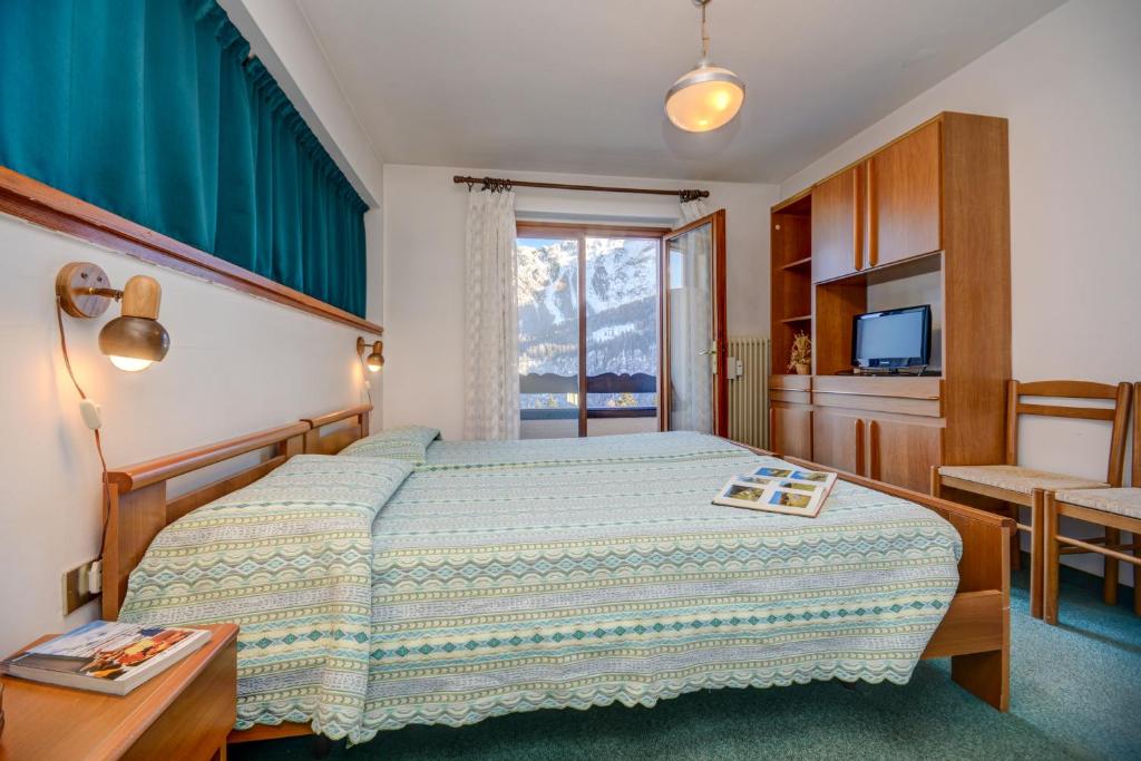 Posteľ alebo postele v izbe v ubytovaní Hotel Splendor
