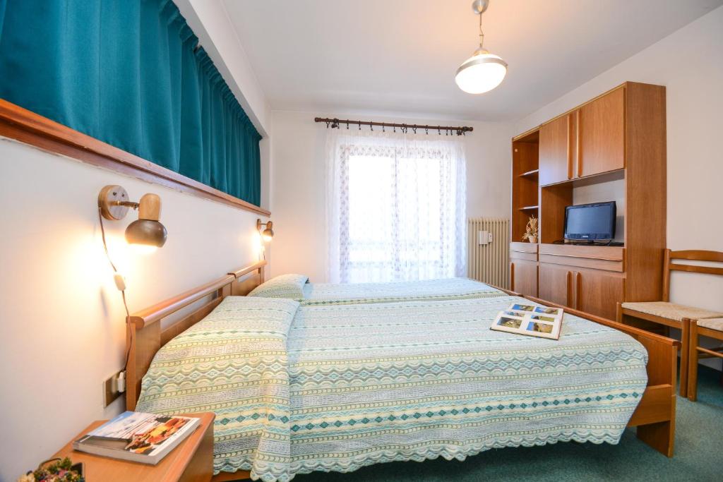 Posteľ alebo postele v izbe v ubytovaní Hotel Splendor