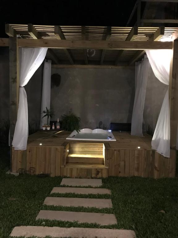 Fotografie z fotogalerie ubytování Cabana da reserva com jacuzzi v destinaci Torres