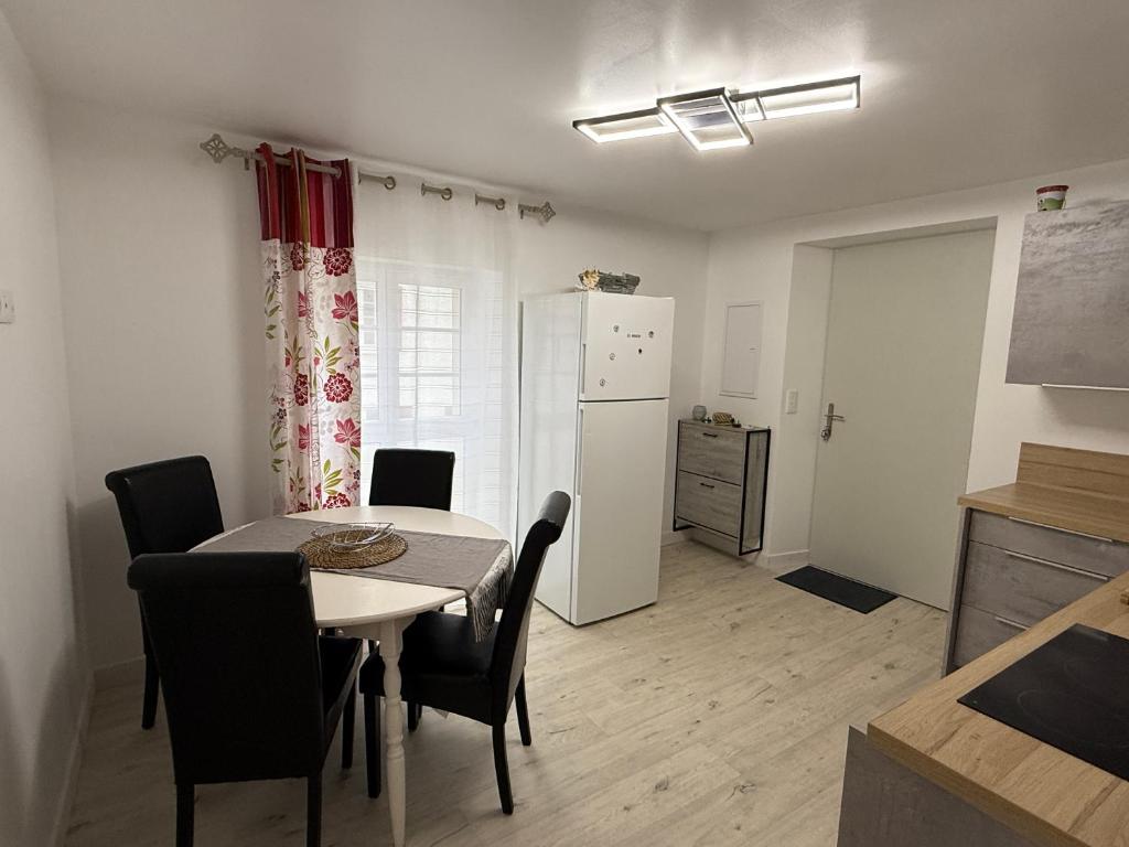 Kuchyň nebo kuchyňský kout v ubytování Comme à la maison