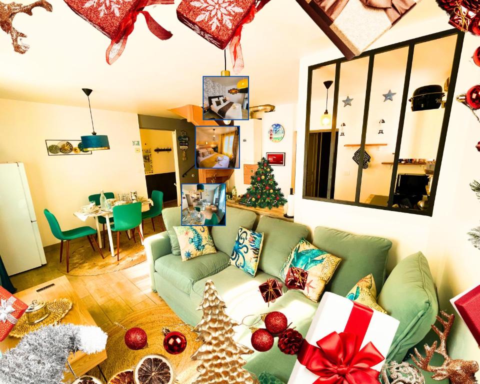 een woonkamer met een groene bank en kerstversieringen bij Giulia House Fécamp - Seaside Escape, Modern & Cozy in Fécamp