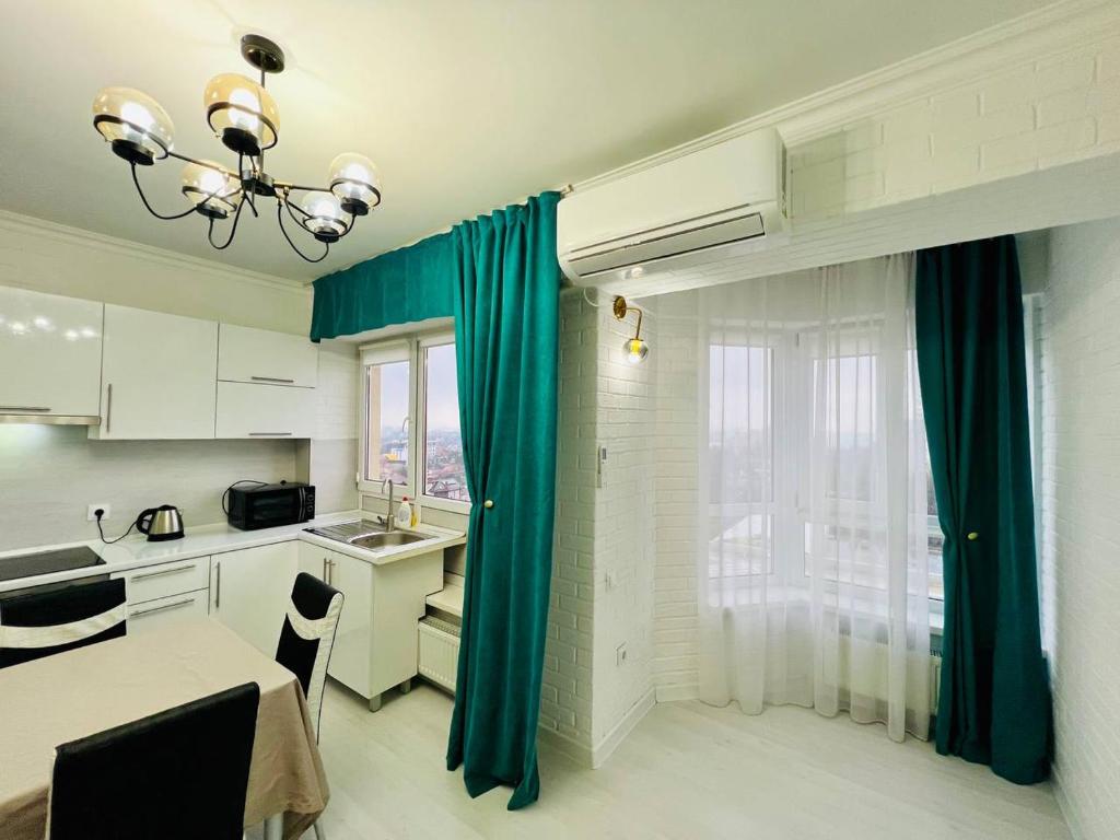 Køkken eller tekøkken på GRAND Home 3 ROOMS Apartment