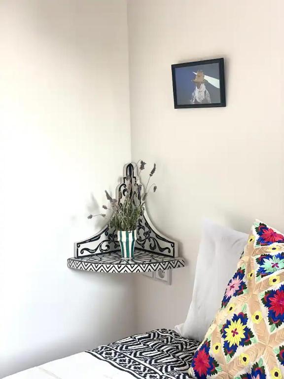 Una cama o camas en una habitación de Dar YAMINA SUIKA