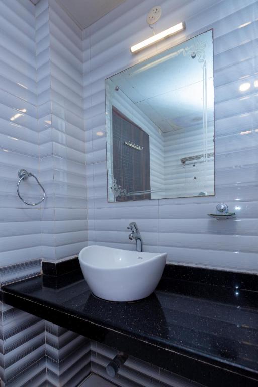 Koupelna v ubytování HOTEL AVISHA Residency