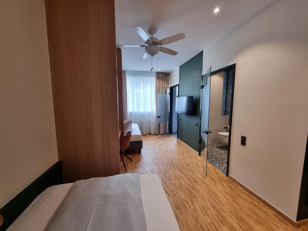 Postel nebo postele na pokoji v ubytování myMINGA13 - Hotel & serviced Apartments