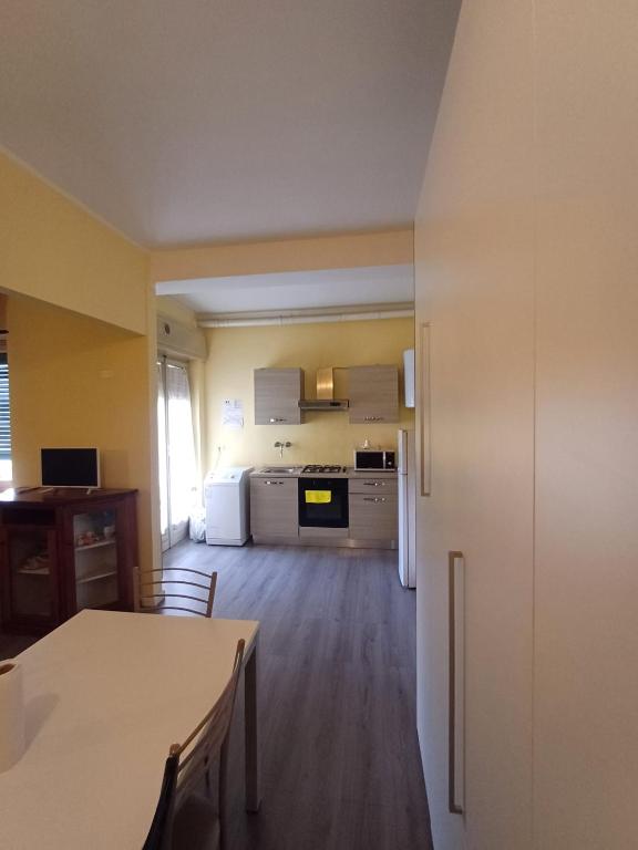 Kuchyň nebo kuchyňský kout v ubytování L'Arena Residence