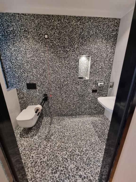 Koupelna v ubytování myMINGA13 - Hotel & serviced Apartments